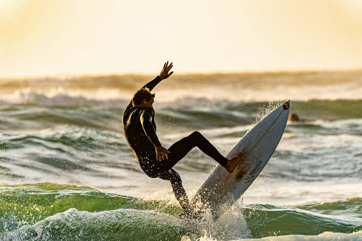 asilomar - conference center shallow focus photography of man surfing pacific grove